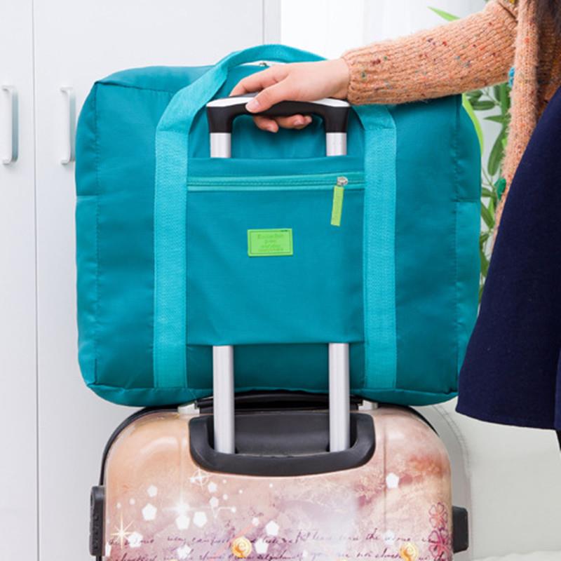sac de voyage pliage portable léger imperméable à l'eau sac de tige de poche vêtements de voyage bagage avion sac de rangement sac de voyage pliage portable léger imperméable à l'eau sac de tige de poche vêtements de voyage bagage avion sac de rangement
