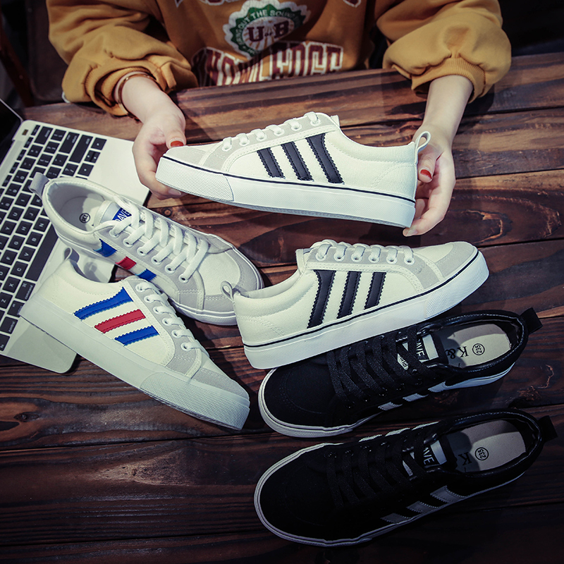 trois barres de marée chaussures d'étudiant de couples conseil chaussures hommes mouvement de loisirs des femmes chaussures de toile haut bas noir blanc ultra incendie trois barres de marée chaussures d'étudiant de couples conseil chaussures hommes mouvement de loisirs des femmes chaussures de toile haut bas noir blanc ultra incendie