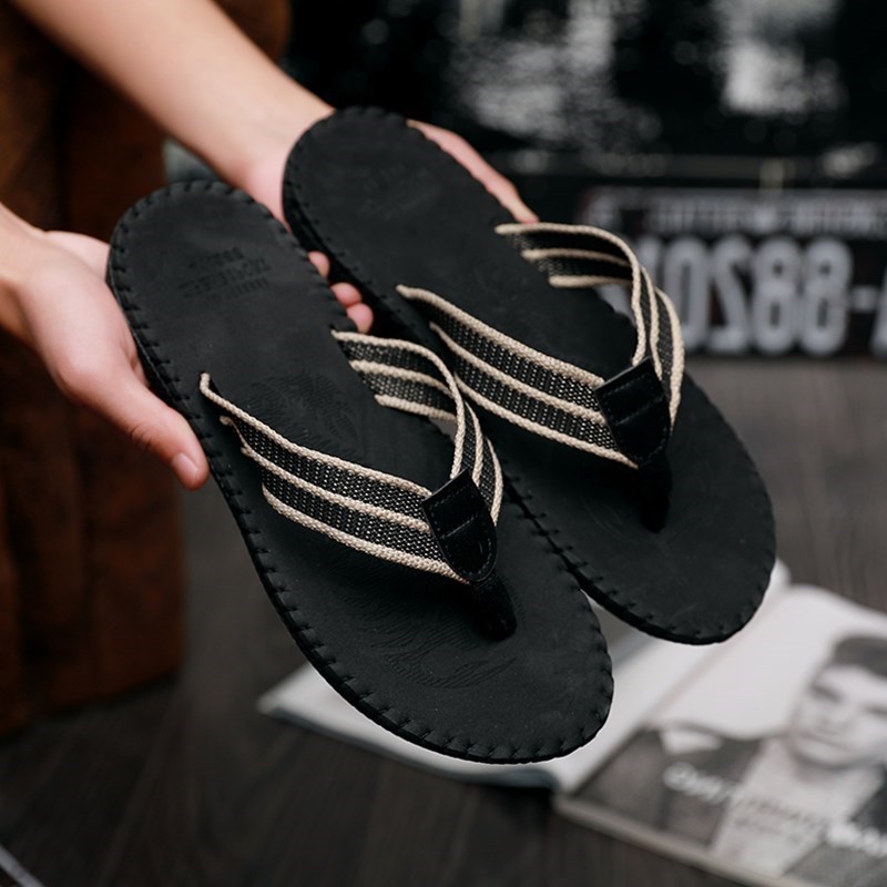 tongs de couple hommes pantoufles antidérapantes été faites glisser le clip d'épaisseur en bas de la marée noire sandales d'été de la personnalité féminine de la plage tongs de couple hommes pantoufles antidérapantes été faites glisser le clip d'épaisseur en bas de la marée noire sandales d'été de la personnalité féminine de la plage