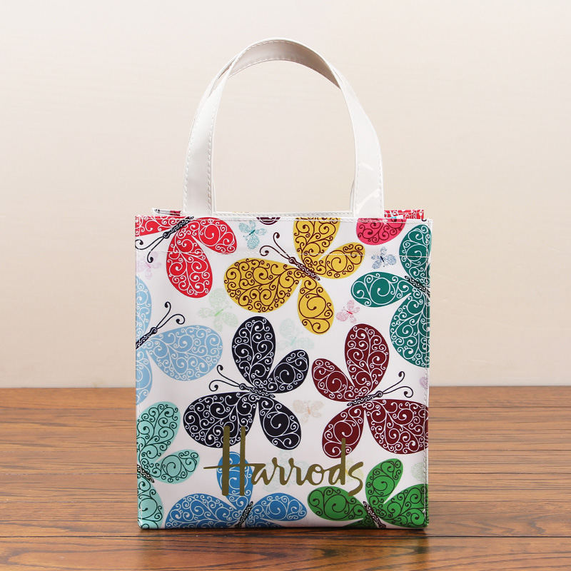 新款 英倫名品 蝴蝶花卉PVC防水環保購物袋手提包 便當包媽咪包