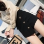 2018 Hàn Quốc cao eo màu đen đơn ngực túi quần short retro hoang dã bất thường Một từ nửa chiều dài quần short culottes chân váy bút chì