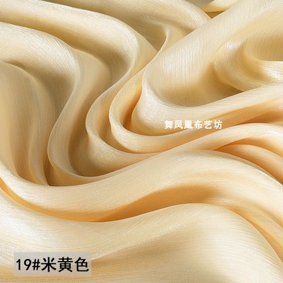 taobao agent Beige silk smooth crystal silk pearl light fabric shiny and bright surface, soft water light yarn island gauze wrinkle, fabric