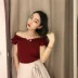 2018 mới hoang dã Hồng Kông hương vị retro chic thời trang Hàn Quốc nhỏ bay tay áo len bị rò rỉ vai rắn màu áo thun top Áo / áo thun