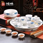 Màu xanh và trắng sứ tinh tế bộ trà hộp quà tặng đặc biệt Kung Fu Jingdezhen tổ ong trà bộ gốm rỗng đĩa trà tròn - Trà sứ