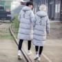 Mùa đông bông áo khoác Hàn Quốc phiên bản của mỏng mỏng áo khoác nam giới và phụ nữ trong phần dài của đầu gối đội mũ trùm đầu xuống áo khoác bông áo khoác nam áo bomber nam