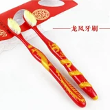 Праздничнная красная зубная щетка, дракон и феникс