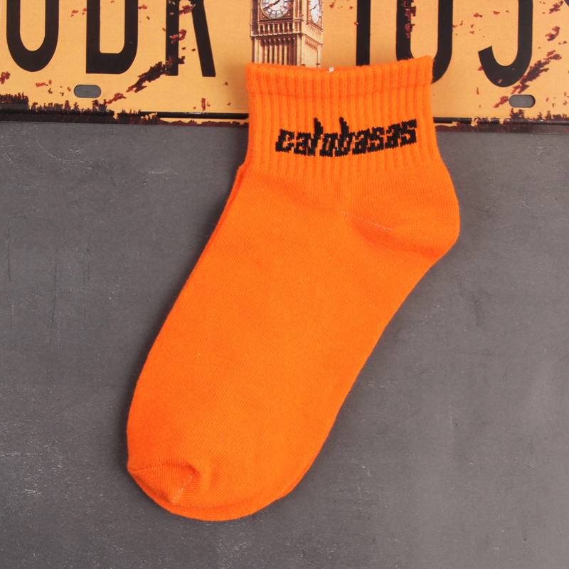 Orange SocksCALABASSA english Kanye yeezy orange Socks men and women Middle cylinder High street fluorescence Fashionable socks Basketball Sports socks