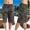 Quần nhiều túi nam cắt quần ngắn giản dị mạnh mẽ mặc quần ngụy trang bãi biển quần yếm mùa hè quần rộng kích thước lớn quần jogger kaki