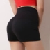 Chín lúa mì một sản phẩm bó sát thể thao quần short nữ chống ánh sáng chạy đào cao eo bụng hip yoga tập thể dục nóng quần - Quần thể thao Quần thể thao