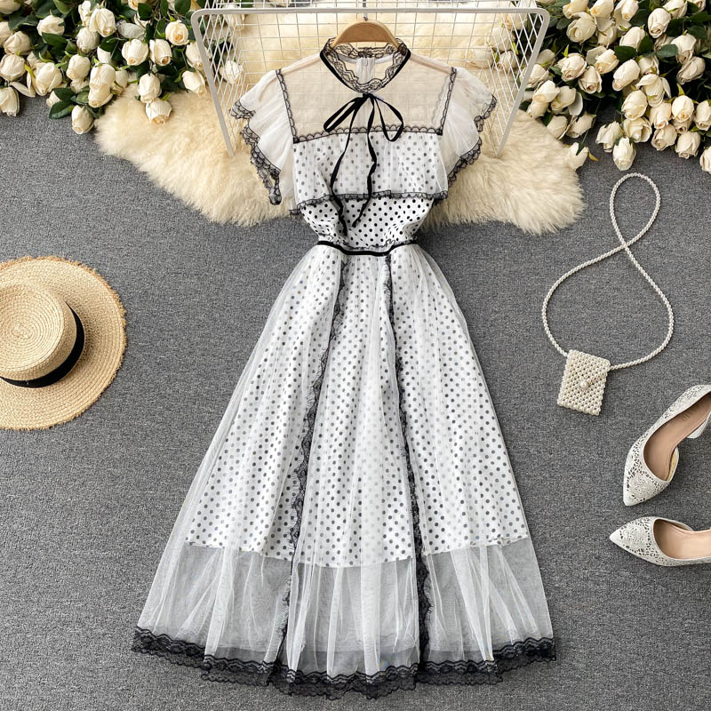 WhiteGong Tingfeng Dress female summer wear Scheming perspective Netting Ruffles Self cultivation Medium and long term Lace lace Fairy Dress