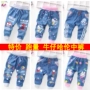 Quần áo trẻ em bán buôn nhà máy trực tiếp mùa hè trẻ em jeans nam và nữ jeans bảy điểm trong quần để đóng phần mỏng váy trẻ em 10 tuổi