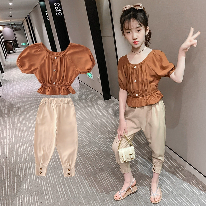 Bộ đồ phong cách phương Tây cho bé gái Mùa hè 2020 New Big Kids Hàn Quốc Tay áo phồng ngắn Tay áo cà rốt Quần dài hai mảnh Xu hướng - Phù hợp với trẻ em