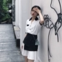 2018 mùa thu mới Hàn Quốc phiên bản của màu sắc tương phản ve áo hoang dã ngắn- tay áo sơ mi nữ + bất thường pleated váy bộ bộ đồ ngủ