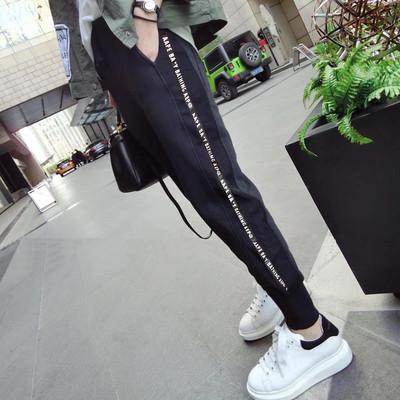 taobao agent Fat mm autumn loose and thin radish Haron pants female large size elastic wild student casual pants 200 catty