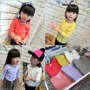 2018 mùa thu Hàn Quốc quần áo cô gái sợi bông nấm màu kẹo áo thun đáy áo thun trẻ em giá rẻ