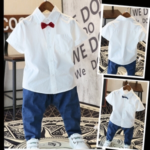 Trẻ em mùa hè của trường tiểu học nhóm áo sơ mi ngắn tay nhỏ máy chủ cotton boy nửa tay áo sơ mi màu trắng tinh khiết đồng phục học sinh