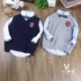 Áo vest trẻ em Anh 2019 mùa xuân và mùa thu bé trai len đan áo vest không tay áo len cotton áo gile cho bé trai