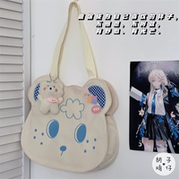 Бежевый слюнявчик