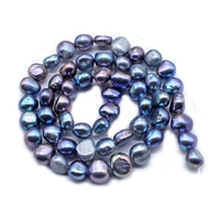 Жемчужина с горизонтальными отверстиями-черными 5-6 мм/около 55 штук