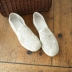 Tai nhỏ sản xuất retro rỗng ren da khâu lót văn học nữ lười biếng giày phụ nữ hoang dã giày thấp giày sục nữ Giày cắt thấp