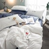 Bộ đồ giường bốn mảnh bông cotton bầu không khí thời trang đơn giản hiện đại chăn Bắc Âu cá tính đồng bằng giường đôi duy nhất