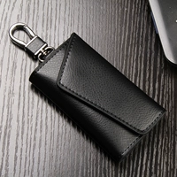 Da túi chìa khóa của nam giới đơn giản công suất lớn túi chìa khóa nữ đa chức năng eo treo da túi chìa khóa mini thực tế ví móc khóa coach