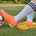 Chính hãng giày bóng đá trẻ em của bị hỏng gai non-slip kick giày bóng đá nam và nữ tiểu học và trung học cạnh tranh đào tạo giày