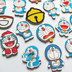 Phim hoạt hình dễ thương Doraemon trâm Túi quần áo trang trí pin nhỏ leng keng huy hiệu máy mèo trâm - Trâm cài trâm cài Trâm cài