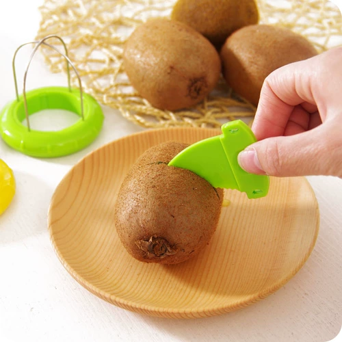 Новое пилинг -устройство Kiwi Fruit использует разветвитель, чтобы очистить нож, чтобы удалить нож