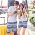 Couple bãi biển quần kỳ nghỉ bên bờ biển Hàn Quốc nam giới và phụ nữ lỏng lẻo khô nhanh kích thước lớn năm điểm quần short mùa hè quần âu thủy triều