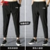 Quần thể thao Li Ning nam mùa hè mỏng phần chân chạy xà ngang quần thường nhanh khô Harlan xu hướng quần chín - Quần thể thao quần short the thao nữ adidas Quần thể thao