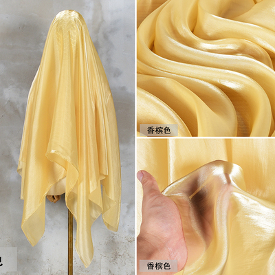 taobao agent Champagne color gauze perspective pearl light fantasy mermaid Ji Liuguang yarn fabric smooth and elegant skirt fabric