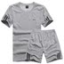 Phòng tập thể dục thể thao phù hợp với nam giới mùa hè ngắn tay quần short người đàn ông béo lỏng đêm chạy cộng với phân bón XL chạy quần áo bộ quần áo gió nam lining Thể thao sau