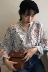 Áo sơ mi hoa mùa thu mới của Hàn Quốc tay áo rộng tay áo voan khí chất cổ tích là áo thun cổ chữ V mỏng áo sơ mi vải lụa Áo sơ mi
