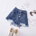 Quần áo trẻ em Hàn Quốc 2019 cho bé gái mùa hè thời trang mới thường có nút quần jeans lỗ quần 5213 - Quần jean