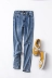 G ¥ 21 cao eo màu rắn phần còn lại chân thiên chúa quần mùa thu 2018 mới hoang dã lỗ quần jeans của phụ nữ