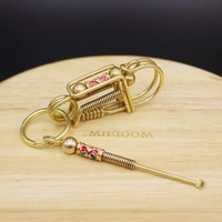 Латунная красная ухочистка