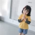 Quần áo trẻ em Hàn Quốc bé trai và bé gái áo thun dài tay cotton mè đường phố trẻ em hoạt hình cha mẹ áo thun trẻ em áo sơ mi mùa thu - Áo thun shop trẻ em Áo thun