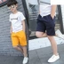 Chàng trai quần short mùa hè năm quần mùa hè quần áo trẻ em bé một nửa quần trẻ em quần short thể thao quần trắng