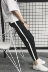 Phiên bản Hàn Quốc của xu hướng quần nam thanh lịch Quần âu nam chân mỏng thể thao màu trắng bên hè quần đen Crop Jeans
