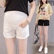 Bà bầu quần short mùa hè thời trang quần jeans tua rua ba điểm quần nóng hè mang thai bụng nâng quần thủy triều mẹ - Phụ nữ mang thai quần / quần bụng