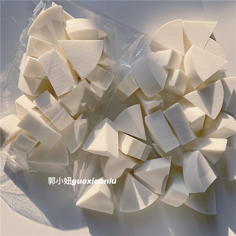 White small triangular leather flour puffs, 20 pieces per bag