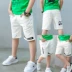 Trai quần short mùa hè 2018 lỗ mới denim cắt quần cotton và linen lớn trẻ em Hàn Quốc phiên bản của trắng 7 quần quần trẻ em Quần jean