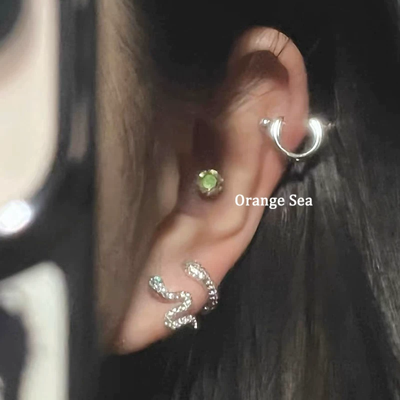 Оранжевые морские супер-ускоряющие острые серьги Девушка дикий Diamond Зеленый глаз Змея Леопард Ниша Винт Ear Bone Nail