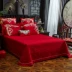 Bộ chăn ga gối cotton dài 60 màu hoang dã Đám cưới lớn màu đỏ bông được nhồi bông bằng vải trải giường 2m - Trải giường