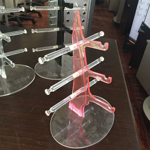 Стенд, трубка, солнцезащитные очки, система хранения