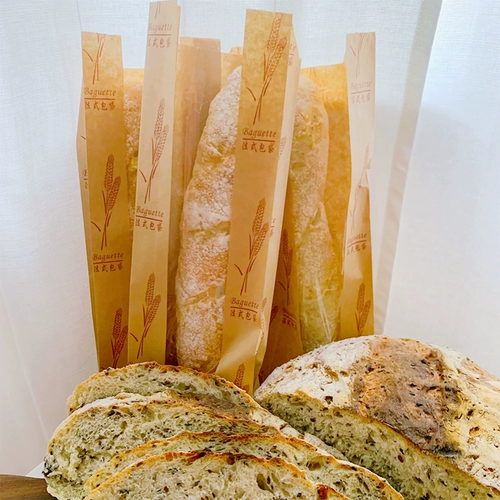 Теперь запеченные длинные упаковочные сумки для хлеба.
