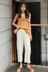 Hàn Quốc phiên bản của xù bên cổ áo sling tops + cao eo là mỏng và droopy chín điểm rộng chân quần thời trang giản dị phù hợp với nữ đầm ngủ nữ Bộ đồ