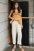 Hàn Quốc phiên bản của xù bên cổ áo sling tops + cao eo là mỏng và droopy chín điểm rộng chân quần thời trang giản dị phù hợp với nữ