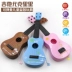 Đàn guitar mô phỏng lớn ukulele Mô phỏng trẻ em từ 1 - 8 tuổi có thể chơi với nhạc cụ đồ chơi